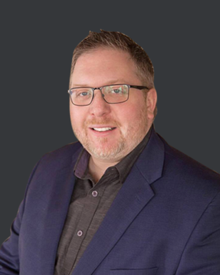 Portrait of Travis Bannert, Associate